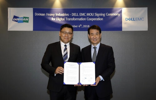 두산중공업과 델EMC 대표자들이 5일 디지털 전환에 합의했다.