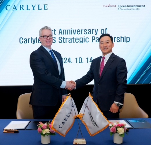 ▲한국투자증권은 글로벌 사모펀드(PEF) 운용사 칼라일그룹(Carlyle Group)과 전략적 제휴 1주년을 맞아 파트너십 강화를 위한 기념 행사를 개최했다고 14일 밝혔다. ⓒ 한국투자증권