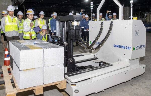 ▲삼성물산 건설부문과 현대건설 협업으로 탄생한 건설로봇 시연회. ⓒ각사